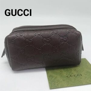 Gucci Dark Brown Embossed Cosmetic Bag